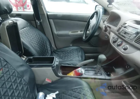 2003 Toyota Camry Le z USA, uszkodzony, nr VIN 4T1BE32K23U773023